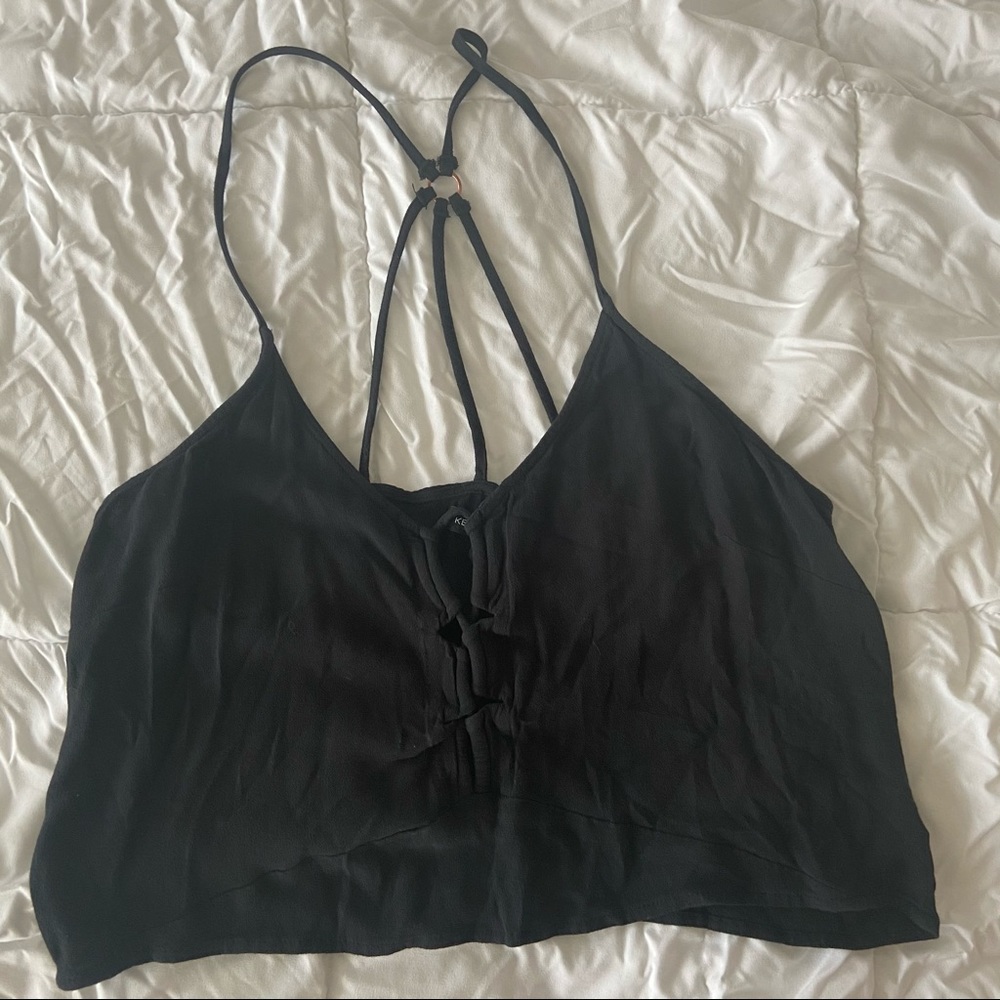 Black flowy crop top with strap detailing